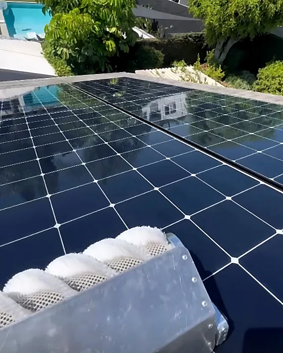 Residential solar panels being cleaned